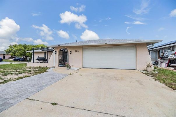Attached, Exterior, Facade, Solar Panels, Ranch