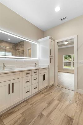 Bathroom, Dual Sink Vanities, Interior, Recessed Lighting, Wood Texture Flooring