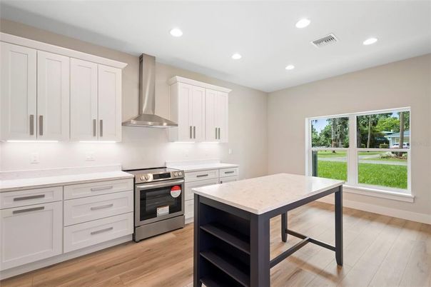 Interior, Kitchen, Recessed Lighting, Stainless Steel Appliances, Wood Texture Flooring