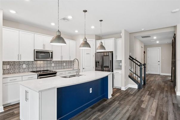 Interior, Kitchen, Pendant Lights, Recessed Lighting, Stainless Steel Appliances, Wood Texture Flooring