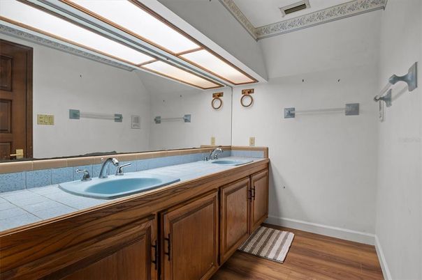 Bathroom, Dual Sink Vanities, Interior, Tile Countertops, Wood Texture Flooring