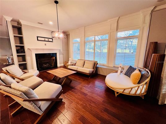Fireplace, Interior, Living room, Pendant Lights, Recessed Lighting, Water, Wood Texture Flooring