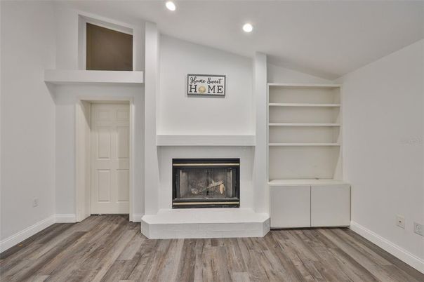 Fireplace, Interior, Recessed Lighting, Wood Texture Flooring