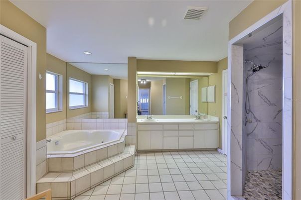 Bathroom, Dual Sink Vanities, Interior, Marble Walls, Recessed Lighting