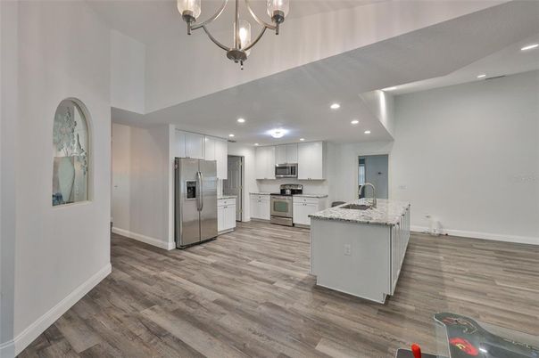Interior, Kitchen, Pendant Lights, Recessed Lighting, Stainless Steel Appliances, Wood Texture Flooring