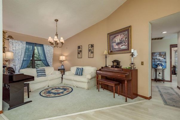 Chandelier, Interior, Living room, Piano, Recessed Lighting, Wood Texture Flooring