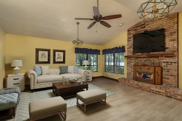 Fireplace, Interior, Living room, Pendant Lights, Stone Walls, Wood Texture Flooring