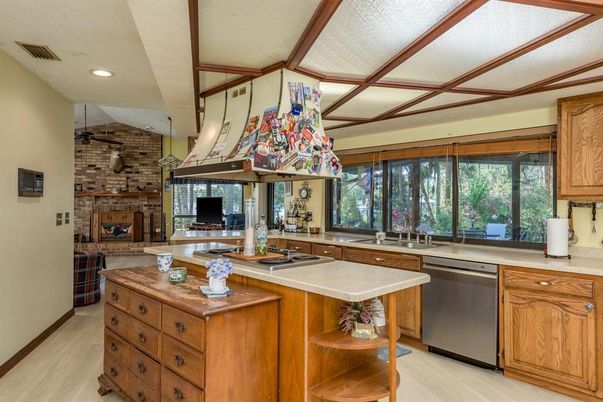 Fireplace, Interior, Kitchen, Recessed Lighting, Stone Walls, Wood Texture Flooring