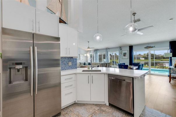 Dining room, Interior, Kitchen, Pendant Lights, Stainless Steel Appliances, Wood Texture Flooring