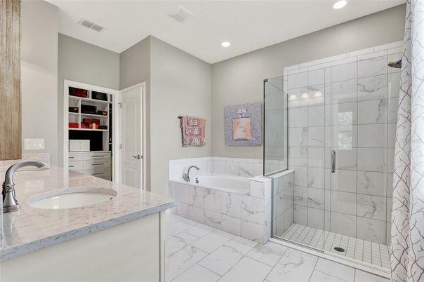 Bathroom, Dual Sink Vanities, Glass Shower, Interior, Marble, Marble Walls, Recessed Lighting