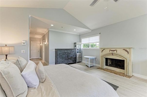 Bedroom, Fireplace, Interior, Recessed Lighting, Wood Texture Flooring