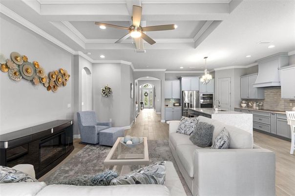 Chandelier, Interior, Kitchen, Living room, Recessed Lighting, Stainless Steel Appliances, Wood Texture Flooring