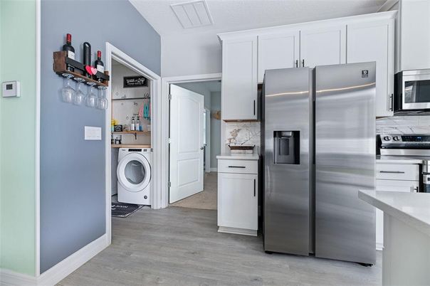 Interior, Kitchen, Stainless Steel Appliances, Utility Closets, Washer, Wood Texture Flooring
