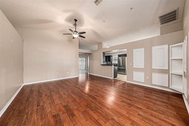 Empty room, Interior, Kitchen, Stainless Steel Appliances, Wood Texture Flooring
