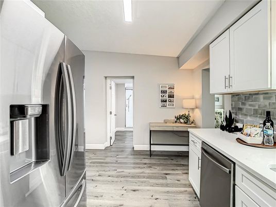 Interior, Kitchen, Recessed Lighting, Stainless Steel Appliances, Wood Texture Flooring