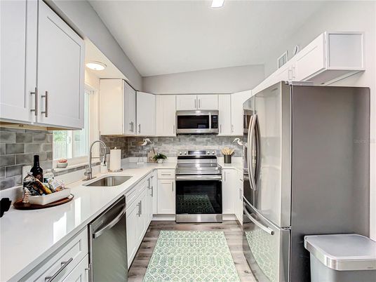 Interior, Kitchen, Recessed Lighting, Stainless Steel Appliances, Wood Texture Flooring