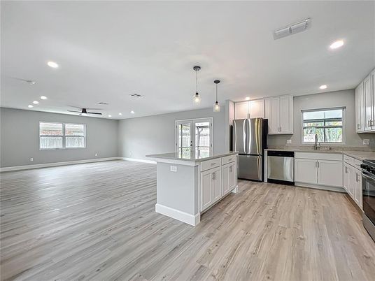 Interior, Kitchen, Pendant Lights, Recessed Lighting, Stainless Steel Appliances, Wood Texture Flooring