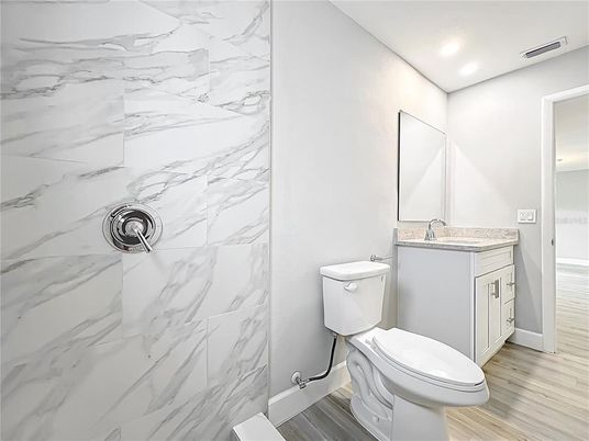 Bathroom, Interior, Marble Walls, Recessed Lighting, Wood Texture Flooring