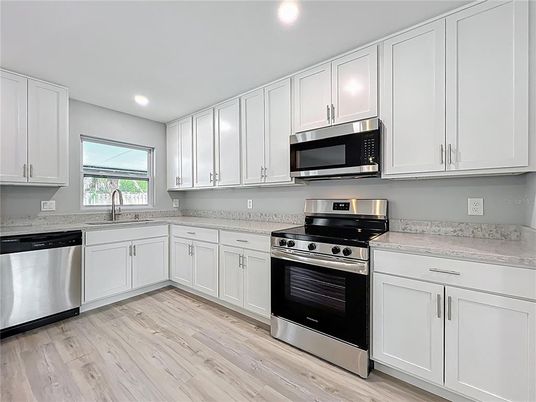 Interior, Kitchen, Recessed Lighting, Stainless Steel Appliances, Wood Texture Flooring