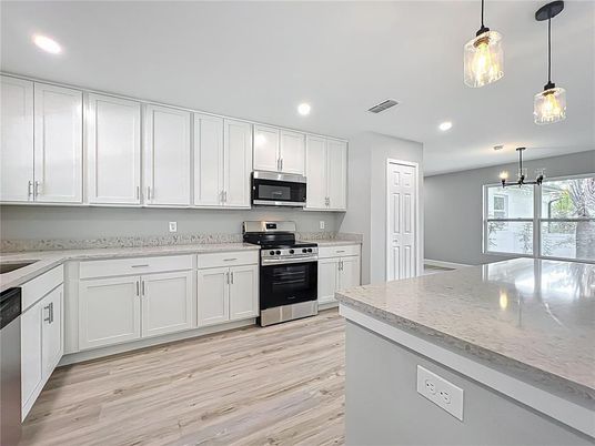 Interior, Kitchen, Pendant Lights, Recessed Lighting, Stainless Steel Appliances, Wood Texture Flooring