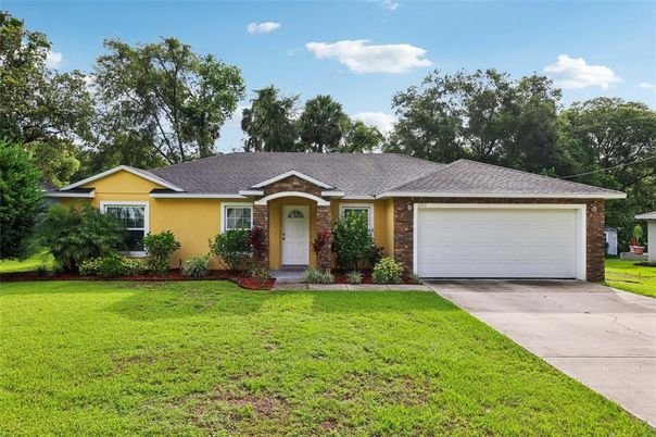 Attached, Backyard, Exterior, Facade, Brick Facade, Ranch
