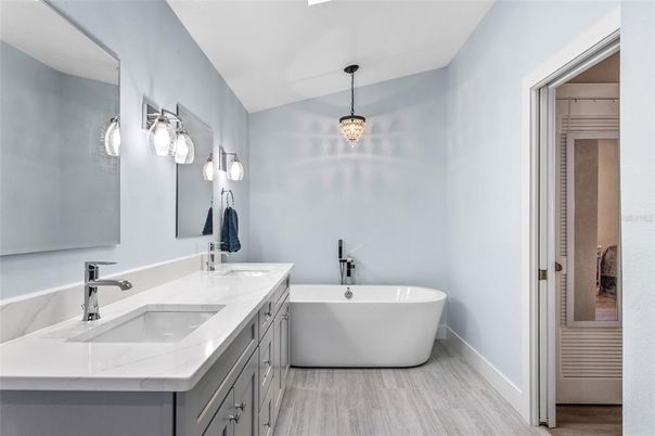 Bathroom, Dual Sink Vanities, Free Standing Baths, Interior, Pendant Lights, Wood Texture Flooring