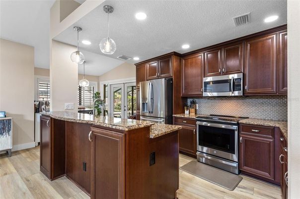 Interior, Kitchen, Pendant Lights, Recessed Lighting, Stainless Steel Appliances, Wood Texture Flooring