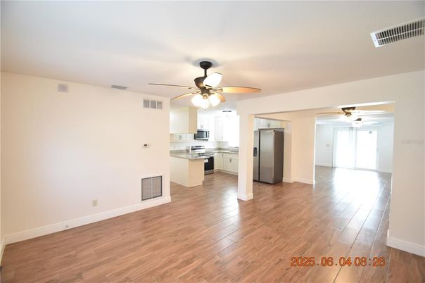 Empty room, Interior, Kitchen, Stainless Steel Appliances, Wood Texture Flooring