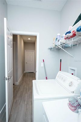 Interior, Recessed Lighting, Utility Closets, Washer, Wood Texture Flooring
