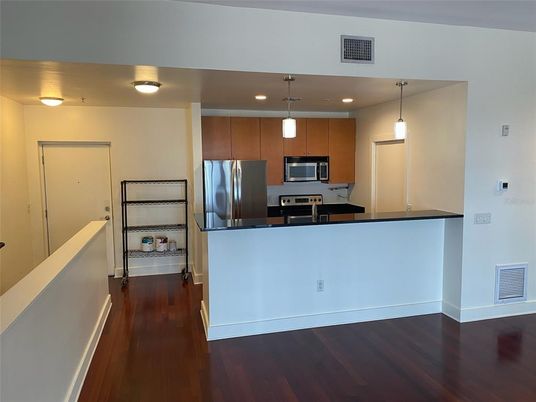 Interior, Kitchen, Pendant Lights, Recessed Lighting, Stainless Steel Appliances, Wood Texture Flooring