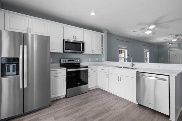 Interior, Kitchen, Recessed Lighting, Stainless Steel Appliances, Wood Texture Flooring