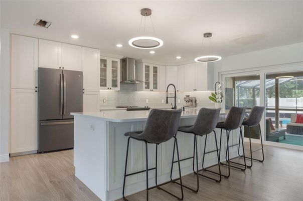 Interior, Kitchen, Pendant Lights, Recessed Lighting, Stainless Steel Appliances, Wood Texture Flooring
