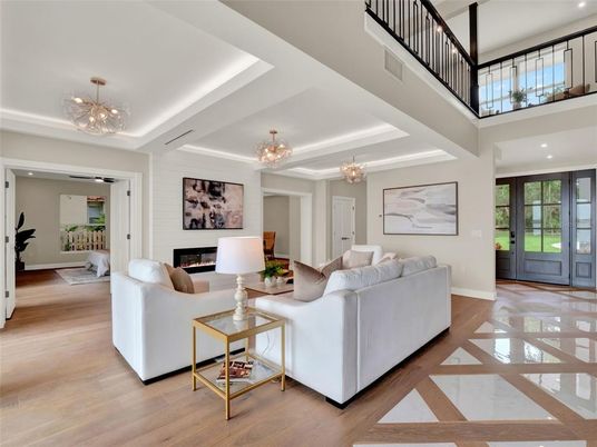 Chandelier, Fireplace, Interior, Living room, Pendant Lights, Recessed Lighting, Wood Texture Flooring