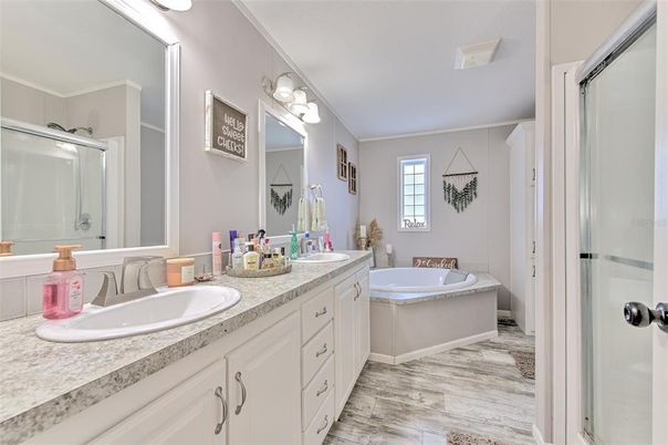 Bathroom, Dual Sink Vanities, Glass Shower, Interior, Wood Texture Flooring