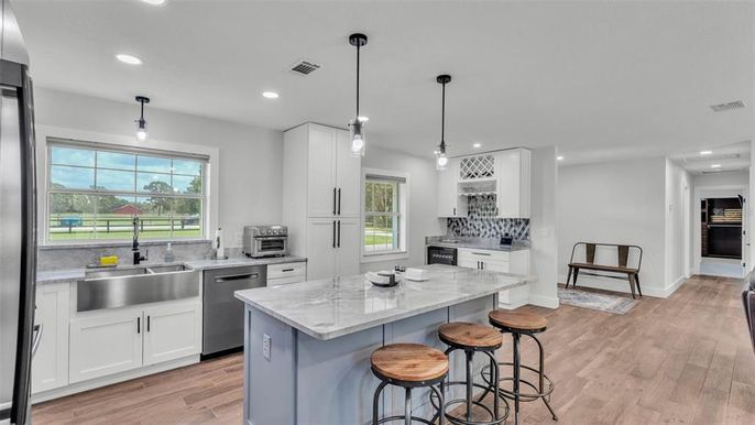 Interior, Kitchen, Pendant Lights, Recessed Lighting, Stainless Steel Appliances, Wood Texture Flooring