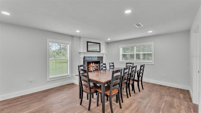 Dining room, Fireplace, Interior, Recessed Lighting, Wood Texture Flooring