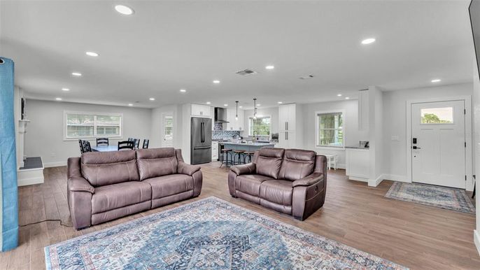 Dining room, Interior, Kitchen, Living room, Pendant Lights, Recessed Lighting, Stainless Steel Appliances, Wood Texture Flooring