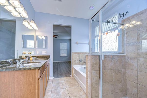 Bathroom, Dual Sink Vanities, Glass Shower, Interior, Wood Texture Flooring