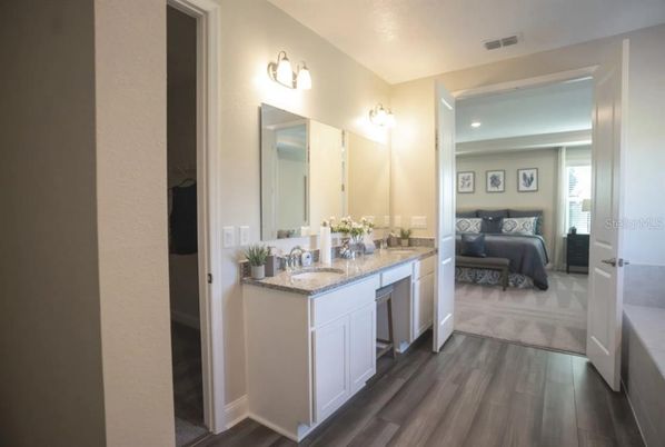 Bathroom, Bedroom, Dual Sink Vanities, Interior, Recessed Lighting, Wood Texture Flooring