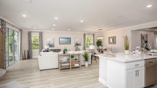 Dining room, Interior, Kitchen, Living room, Pendant Lights, Recessed Lighting, Stainless Steel Appliances, Wood Texture Flooring