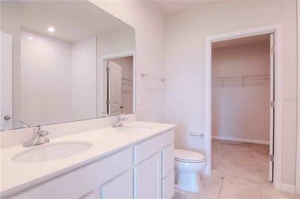 Bathroom, Dual Sink Vanities, Interior, Recessed Lighting, Walk-in Closets