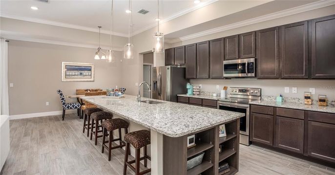 Dining room, Interior, Kitchen, Pendant Lights, Recessed Lighting, Stainless Steel Appliances, Wood Texture Flooring