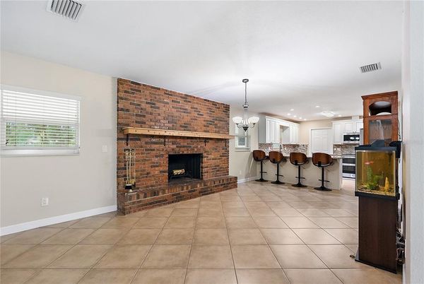 Chandelier, Fireplace, Interior, Kitchen, Pendant Lights, Recessed Lighting, Stone Walls