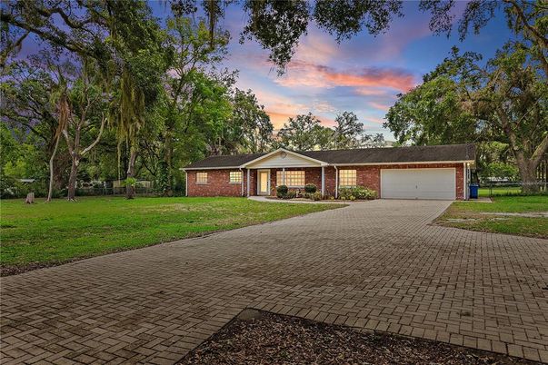 Attached, Backyard, Exterior, Facade, Brick Facade, Ranch