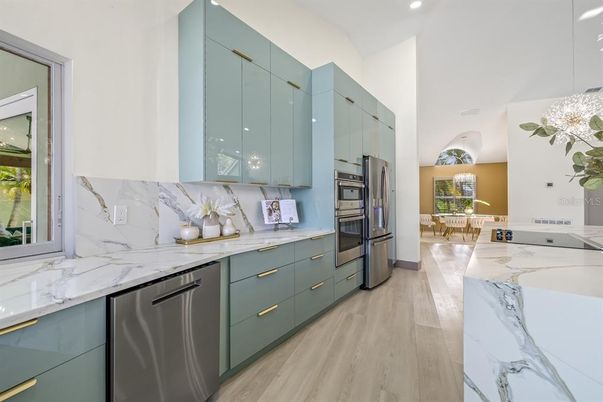 Dining room, Interior, Kitchen, Recessed Lighting, Stainless Steel Appliances, Wood Texture Flooring