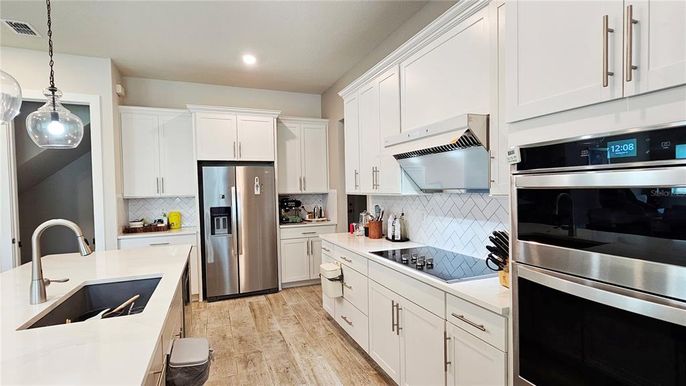 Interior, Kitchen, Pendant Lights, Recessed Lighting, Stainless Steel Appliances, Wood Texture Flooring