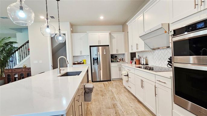 Interior, Kitchen, Pendant Lights, Recessed Lighting, Stainless Steel Appliances, Wood Texture Flooring