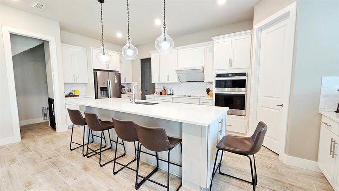 Interior, Kitchen, Pendant Lights, Recessed Lighting, Stainless Steel Appliances, Wood Texture Flooring