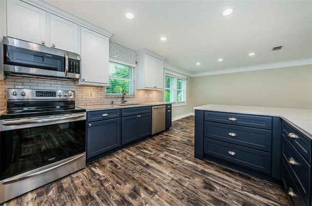 Interior, Kitchen, Recessed Lighting, Stainless Steel Appliances, Wood Texture Flooring