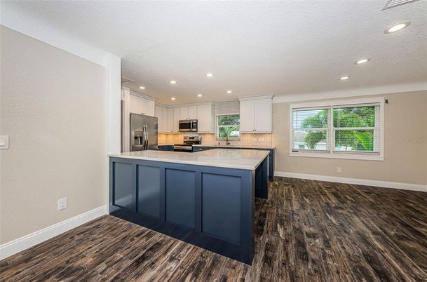 Interior, Kitchen, Recessed Lighting, Stainless Steel Appliances, Wood Texture Flooring